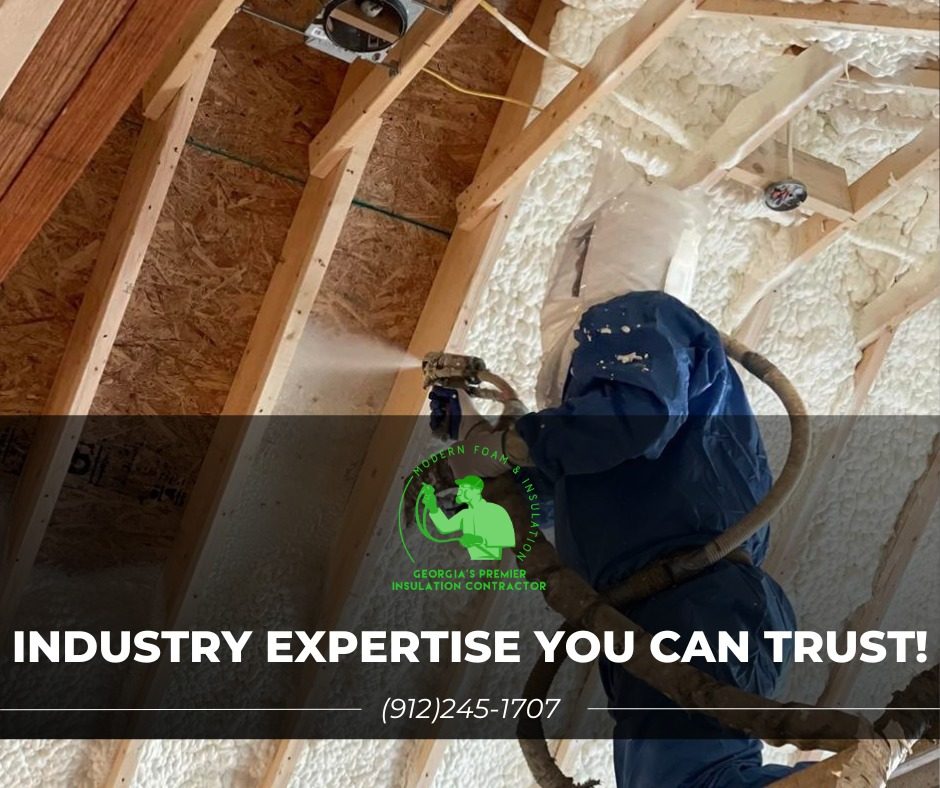 Modern Foam & Insulation installer spraying foam in an attic. Industry expertise you can trust! (912) 245-1707