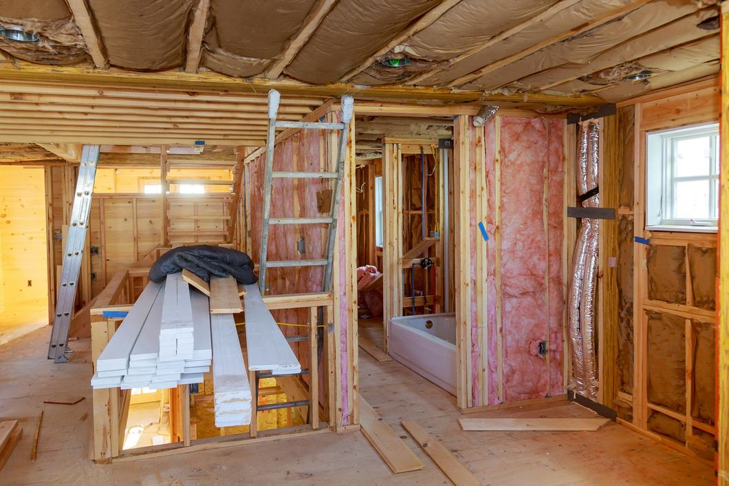 Fiberglass insulation in the walls of a house under renovation